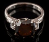 A natural fancy, very dark brown diamond single-stone ring: the cushion-shaped,