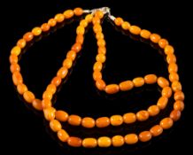 A graduated amber bead,
