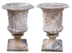 A pair of reconstituted stone garden urns: of campagna shape,
