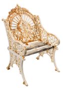 A Victorian cast iron and white painted garden armchair:,