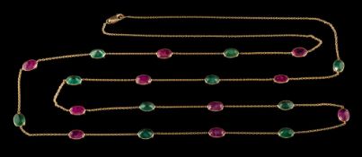 An emerald and ruby necklace: with oval emeralds and rubies each approximately 7mm x 5mm,