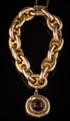 A 19th century hollow gold 'anchor chain' link bracelet: with attached snake motif and cabochon