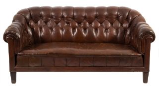 A Swedish Chesterfield style sofa:, fully upholstered in brown buttoned leather,