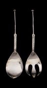 A pair of Iona silver salad servers, maker I.M.