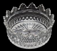 An unusual early 19th century cut glass coaster: with foliate and fan cut rim and star cut base,