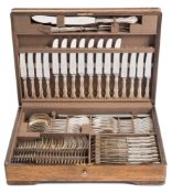 An Elizabeth II silver fiddle scroll and shell pattern flatware service, maker Mappin & Webb,