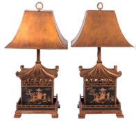 A pair of black lacquer giltwood and chinoiserie decorated Pagoda lamps:, with gilt metal shades,