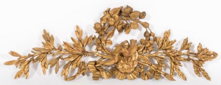 A carved giltwood cresting:,