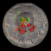 A St Louis 'cherry' paperweight: set with a branch supporting a pair of cherries and two leaves
