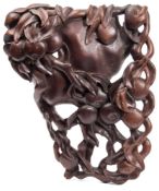 William Horace Muir (American 1902-1964) A carved hardwood panel: of a gourd with trailing fruit