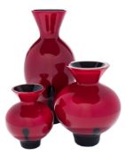 Three Caithness Ebony Flame vases: each of globular or oviform with flaring neck, the black,