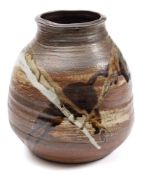 * Janet Leach [1918-1977] a stoneware vase: of tapering oviform with mildly flaring neck the russet