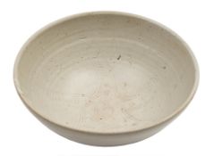 A Winchcombe Pottery stoneware bowl: of circular form the interior incised with a starfish motif