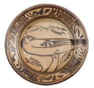 * Seth Cardew [1934-2016] a stoneware dish: of shallow circular form decorated with a lustrous