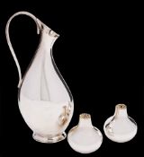 A pair of Stuart Devlin onion-shaped silver condiments, London,