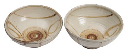 * Michael Cardew [1901-1983] a pair of stoneware bowls: of circular form with incised rings above