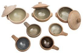 A small group of St Ives domestic stoneware: comprising three bowls and covers with celadon glazed