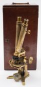 A Victorian lacquered brass binocular microscope by Marrat & Short, London:,