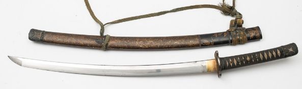 A Japanese katana: with 58cm blade signed Hizen no kuni Tadahiro with single hamon,
