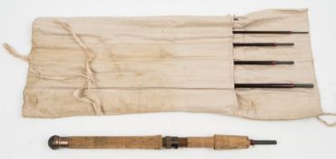 A Hardy's 'Graphite Smuggler De-Luxe Spinning' 8ft 3 inch rod: of seven sections in a canvas roll.