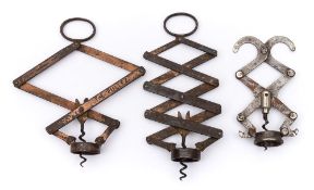 A Wier's patent lazy tongs corkscrew by James Heeley & Sons:,