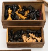 Two boxwood and ebony Staunton pattern chess sets:, both unsigned, height of white Kings 7.