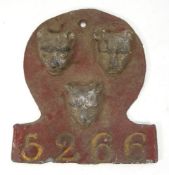 A Salop Fire Office lead mark:, with the city arms in high relief on a circular section,