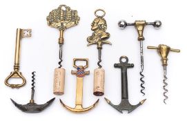 A group of eight various brass corkscrews:, including two fist and bar examples,