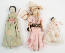 A group of three late 19th/early 20th century wooded 'Dutch' or 'peg' dolls:,