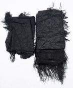 Two late 19th/early 20th century black lace shawls with tasselled fringes:,