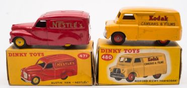 Dinky 471 Austin Van in 'Nestle's livery together with 480 Bedford 10cwt Van in 'Kodak' livery.