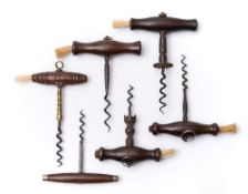 A group of six 19th century and later rosewood handled corkscrews:,