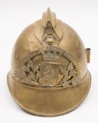 An early 20th century French fireman's brass helmet:,