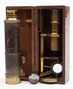 A lacquered brass student microscope in mahogany case:, unsigned,