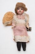 A German bisque headed doll by 'W & Co', (probably Wiefel & Co):, blonde wig,