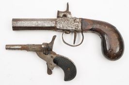 A percussion cap boxlock pistol:, the short 2 1/2 inch fixed barrel over engraved action,