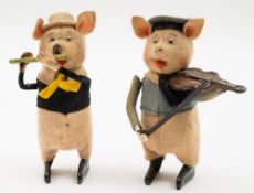 Schuco (Germany) two pig musicians:, violinist and flutist,