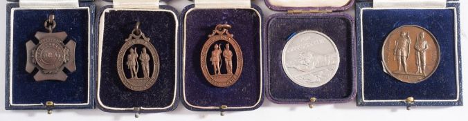 Three silver National Rifle Association medallions:, 7oz,