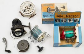 A Hardy 'Unique' 3 /1/8 inch fly reel:, together with a Hardy landing net, an Intrepid Sea Streak,