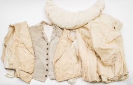 An early 20th century white cotton skirt with bustle:,