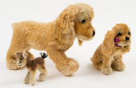 A Steiff blonde plush seated Spaniel:,