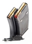 A WWII German MG13 Lightmachine gun clip with inert cartridges and a SA80 clip with inert