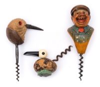 A painted carved wood corkscrew of a laughing man:,