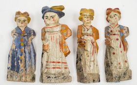 A group of four early Russian wooden dolls:, circa 1880's, comprising a lady and three maids,