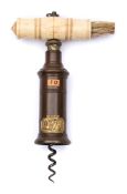 An early 19th century double action corkscrew by Dowler:, circa 1820, turned bone handle with brush,