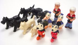 Two Japanese filled celluloid figures of Mickey Mouse and two similar of a long billed Donald Duck,