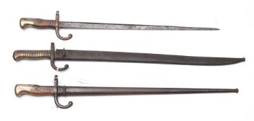 Two WWI period Gras bayonets and a Chassepot bayonet:, (3) .