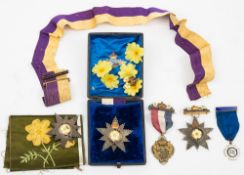 Three Primrose League Star Medals for Outstanding Contribution: together with a silk armband,