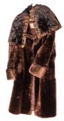 A mid-20th century three-quarter length fur coat by Seegalfurz, London:,