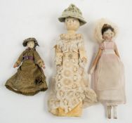 A group of three late 19th/early 20th century wooded 'Dutch' or 'peg' dolls:,